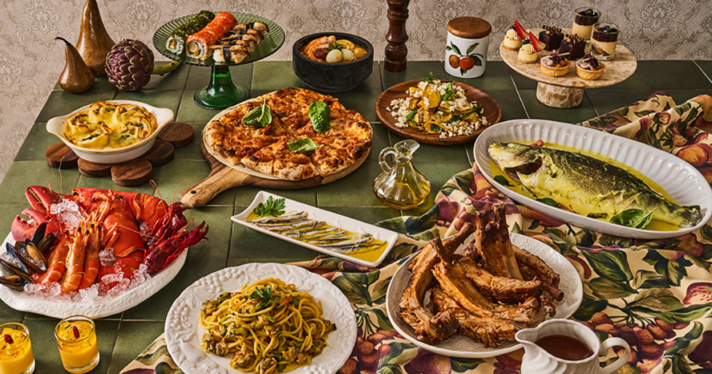 An inviting Italian buffet spread at LUCE, InterContinental Singapore, featuring freshly baked pizzas, al dente pasta, gourmet roasts, seafood selections, and decadent desserts, beautifully arranged for an indulgent dining experience.
