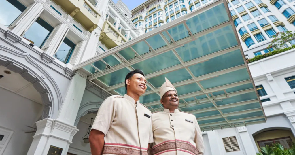 The elegant exterior of InterContinental Singapore, showcasing its grand architecture with classic colonial-style design and modern luxury.