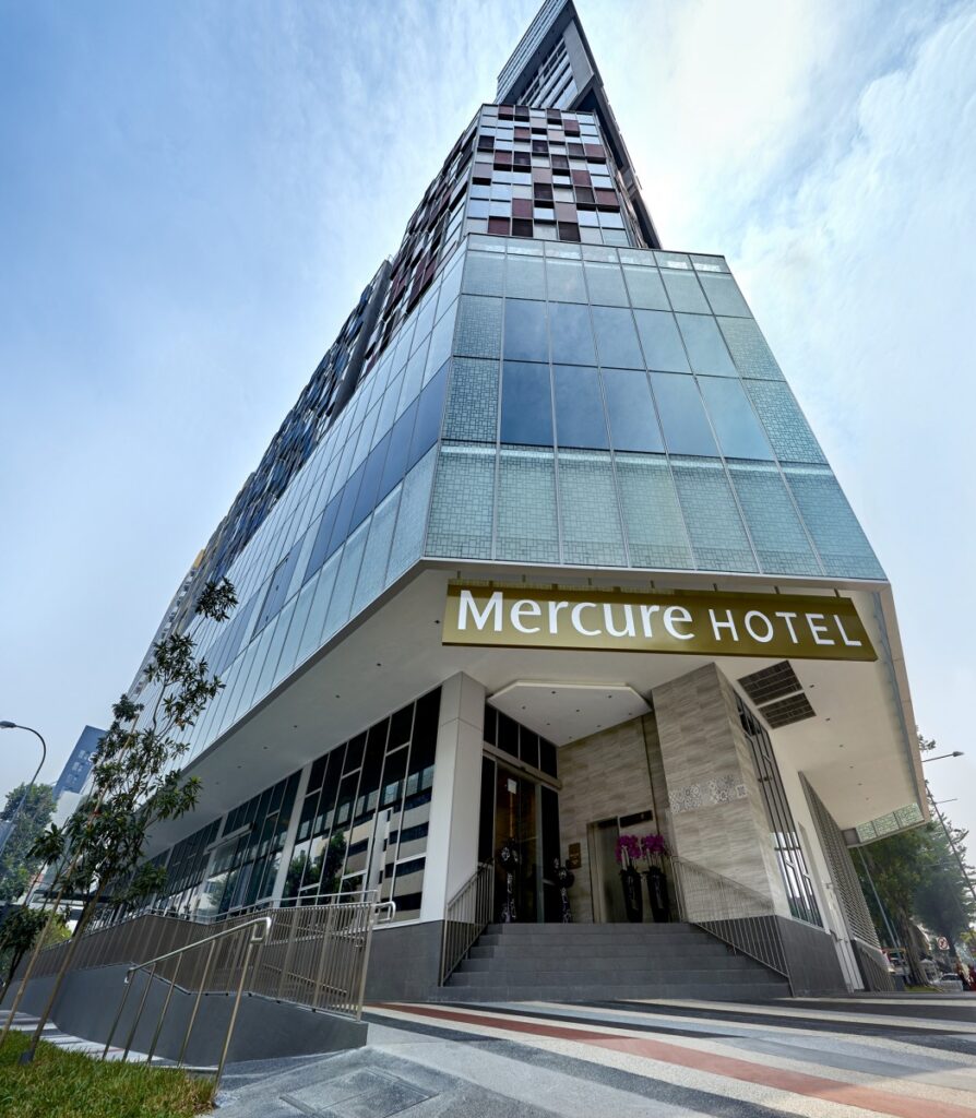 The exterior of Mercure Singapore Bugis, a modern hotel with a sleek design, located in the heart of Singaporeβs vibrant Bugis district.